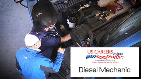 Mechanics working on a diesel engine.